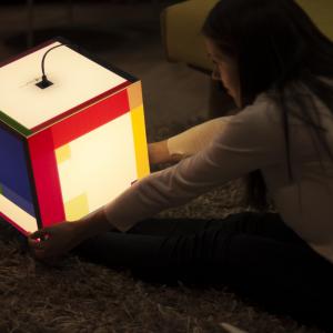 This light cube mood lamp shines the colors and will soften up any heart out there