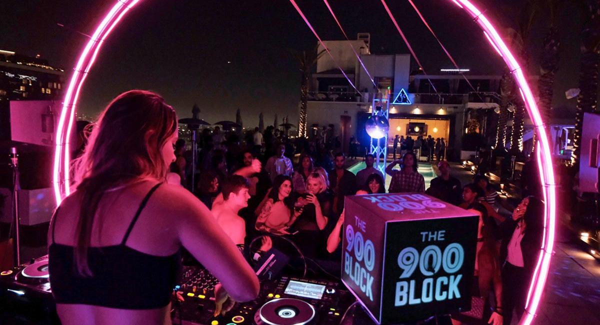 Rad music promoters enjoying the power of custom DJ light