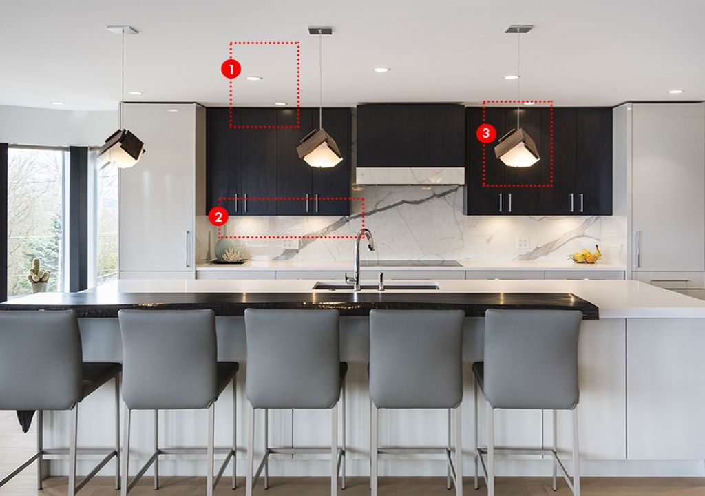 A kitchen showing ambient, task and accent lighting