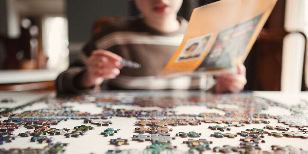 Boy working on Puzzle