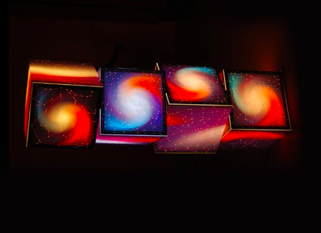 Multiple light cubes with galaxy image