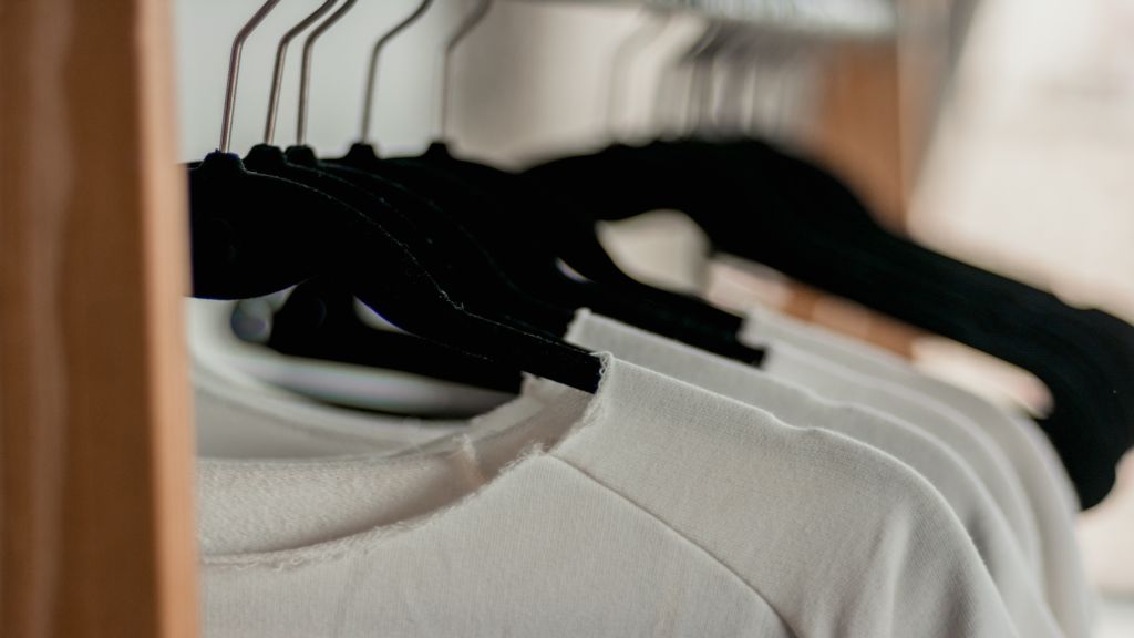 T-shirts on a rack as best artist merchandise