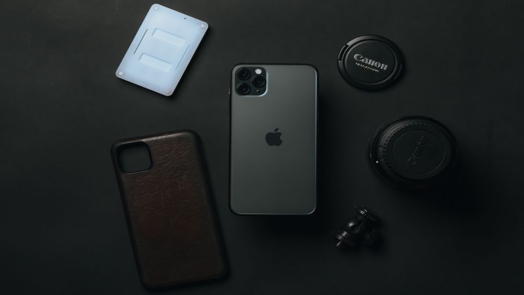 iPhone and a leather phone case with camera lens